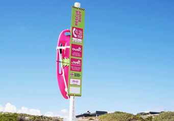 Pink rescue buoy bloubergstrand
